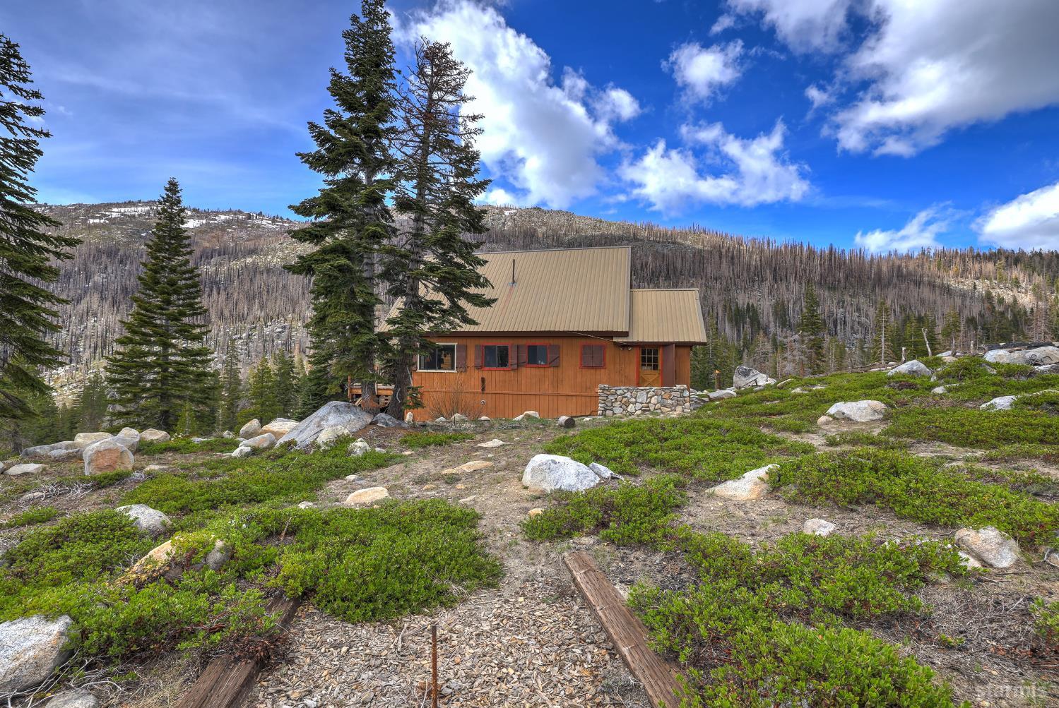 2051 Huckleberry Road Twin Bridges, CA 95735 - Photo 33 of 40 a view of a house with a yard