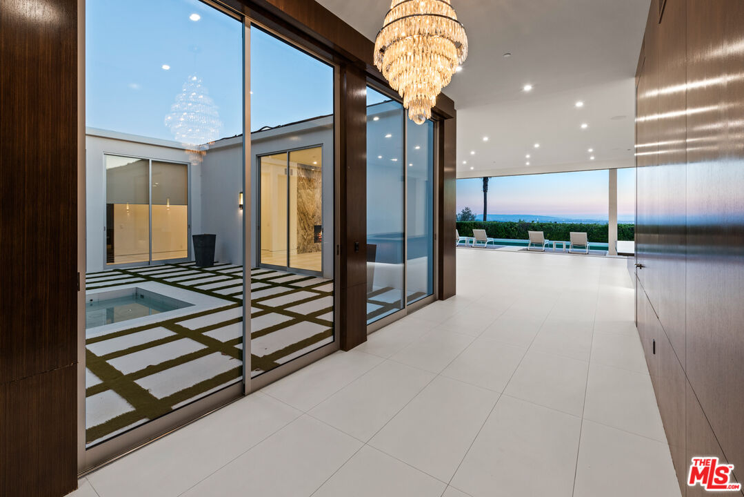 1115 Wallace Ridge Beverly Hills, CA 90210 - Photo 11 of 18 a very nice looking room with a large window