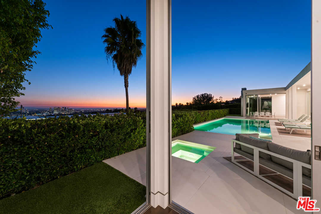 1115 Wallace Ridge Beverly Hills, CA 90210 - Photo 5 of 18 a view of a garden with a slide