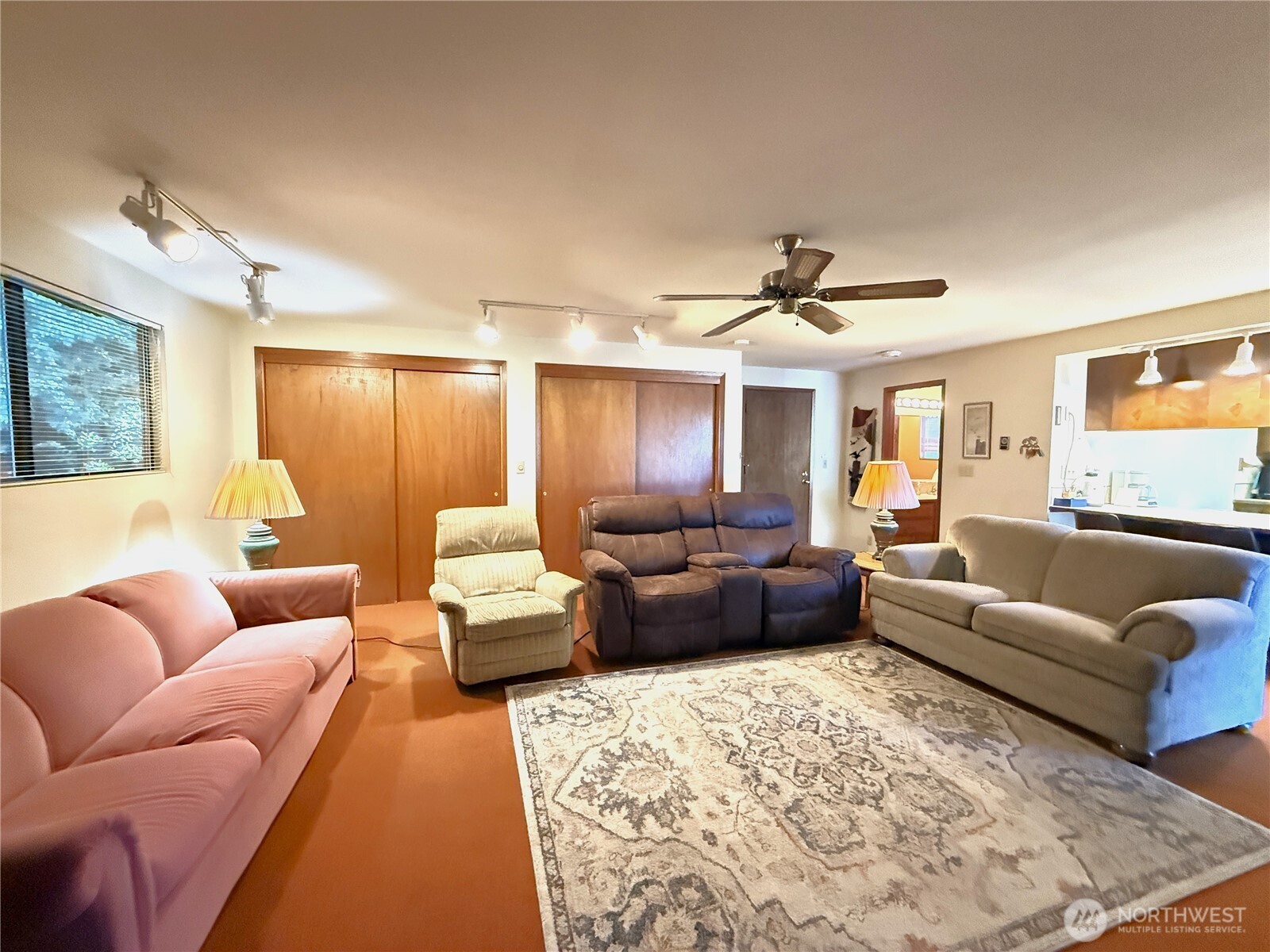 23 Copalis Rv Lane Copalis Beach, WA 98535 - Photo 12 of 40 a living room with furniture and a chandelier