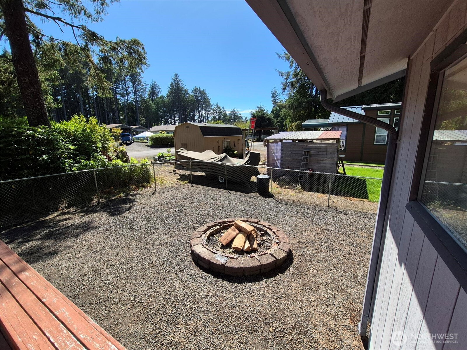 23 Copalis Rv Lane Copalis Beach, WA 98535 - Photo 29 of 40 a view of a backyard with sitting area