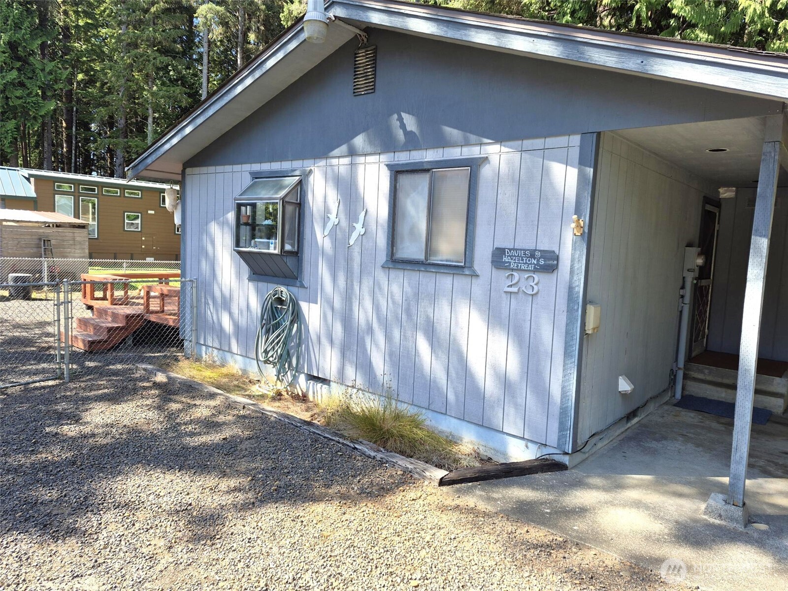 23 Copalis Rv Lane Copalis Beach, WA 98535 - Photo 4 of 40 a view of a house with a yard