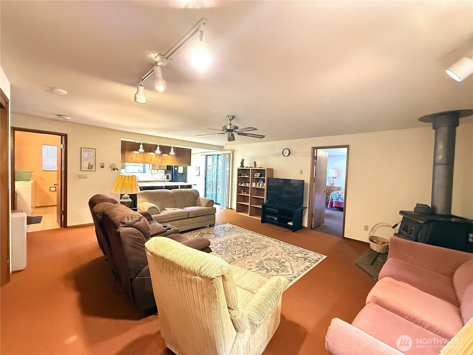 23 Copalis Rv Lane Copalis Beach, WA 98535 - Photo 7 of 40 a living room with furniture a fireplace and a flat screen tv