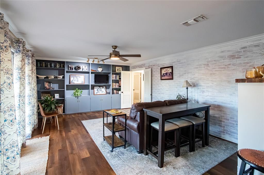 909 Cherry Street Baird, TX 79504 - Photo 11 of 32 a view of a workspace with furniture