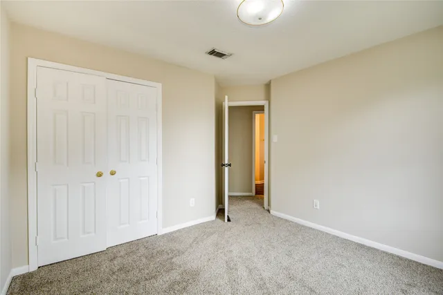 a view of a room with closet area