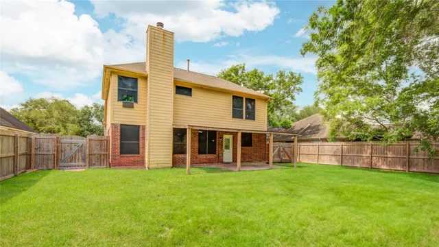 a front view of house with yard