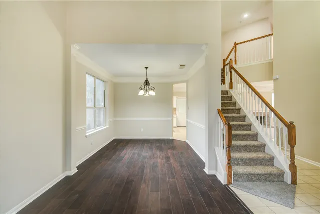 a view of entryway with wooden floor