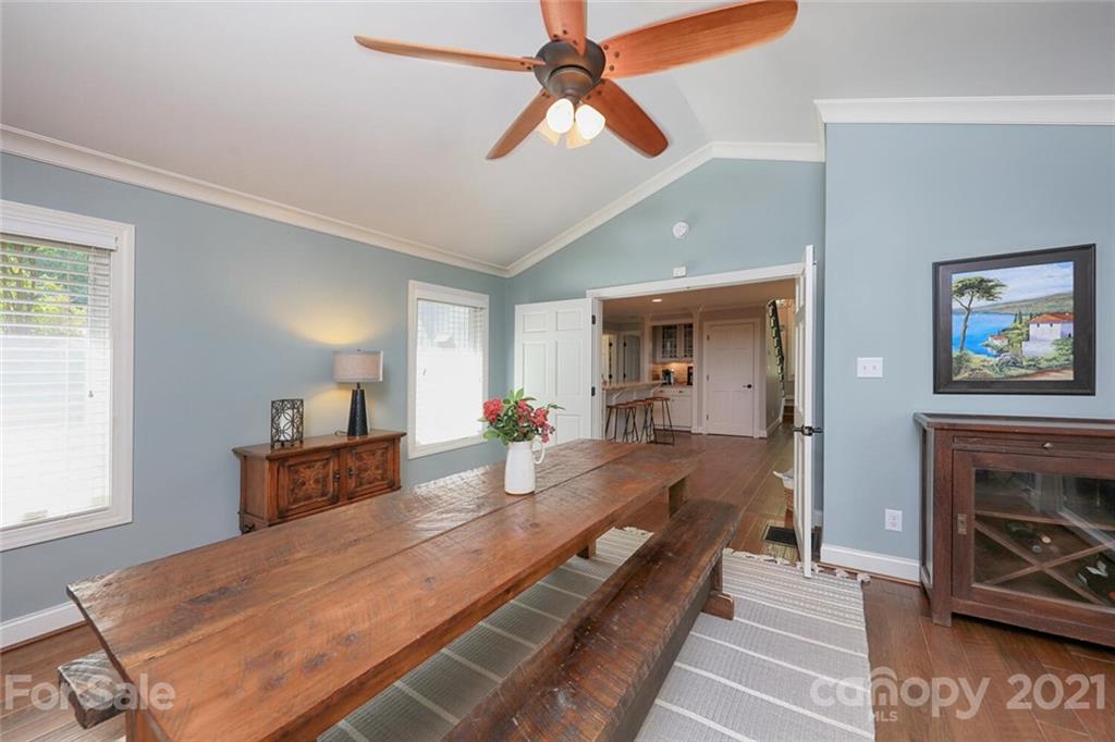 155 Agnew Road Mooresville, NC 28117 - Photo 12 of 37 a bedroom with furniture and a fireplace