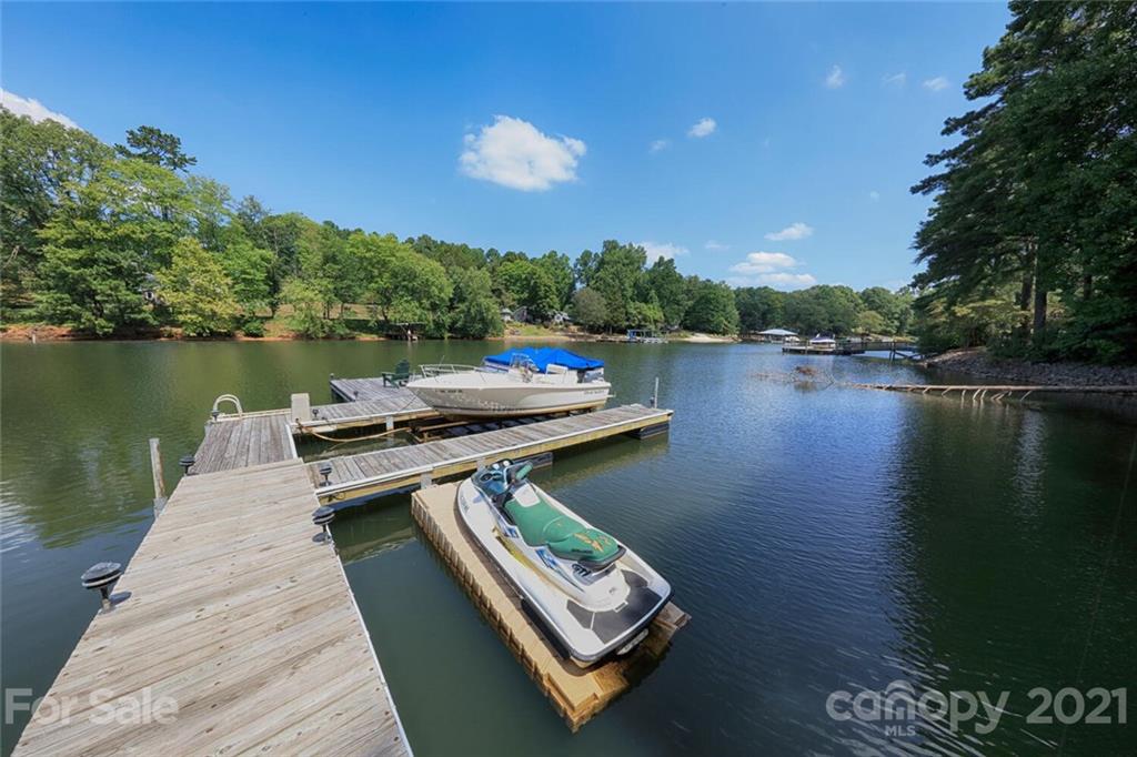 155 Agnew Road Mooresville, NC 28117 - Photo 32 of 37 a view of a lake with a mountain