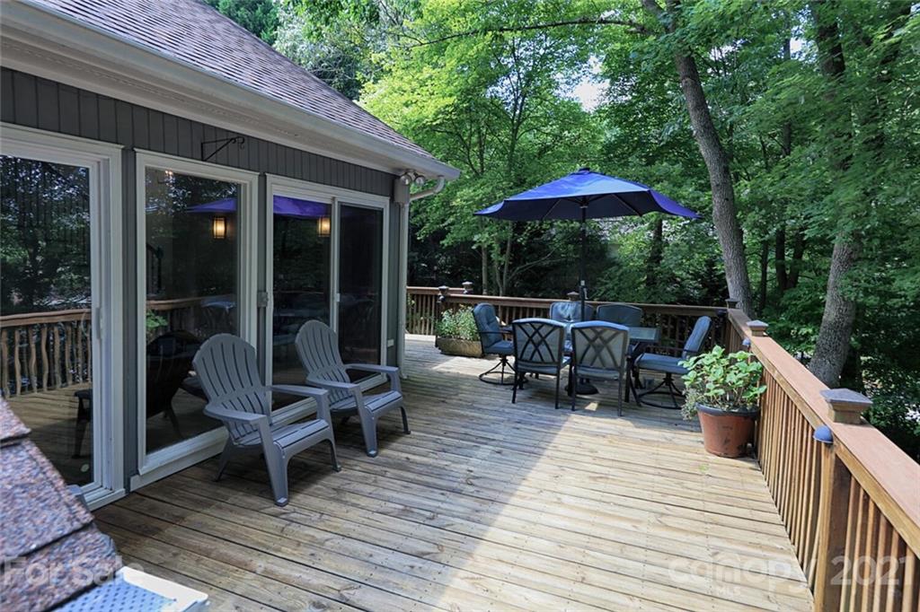 155 Agnew Road Mooresville, NC 28117 - Photo 8 of 37 a view of outdoor sitting area with furniture and wooden deck