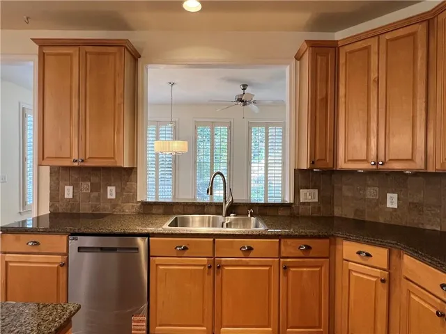 a view of an entryway with a workspace