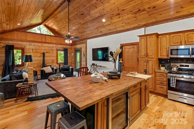 a kitchen with wooden cabinets and a sink