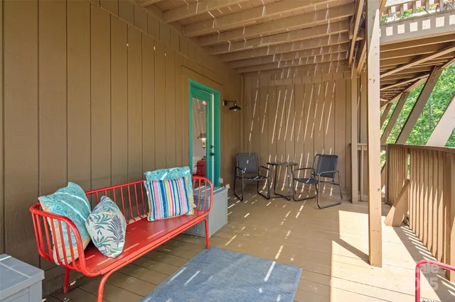 a view of backyard with seating space