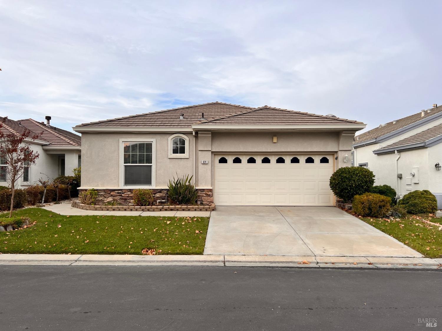 624 Deerfield Way Rio Vista, CA 94571 - Photo 1 of 1 a front view of a house with a yard and garage
