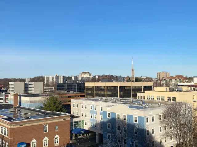 a view of a city that has tall buildings