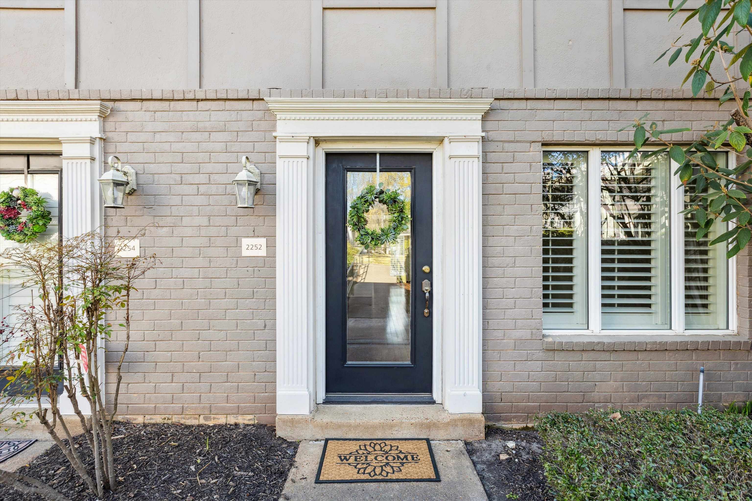 2252 West Germantown Square Germantown, TN 38138 - Photo 1 of 27 Doorway to property featuring brick siding