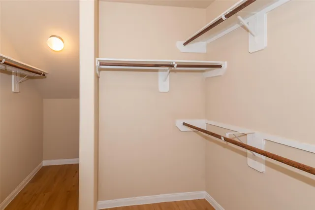 a view of a room with racks on the wall