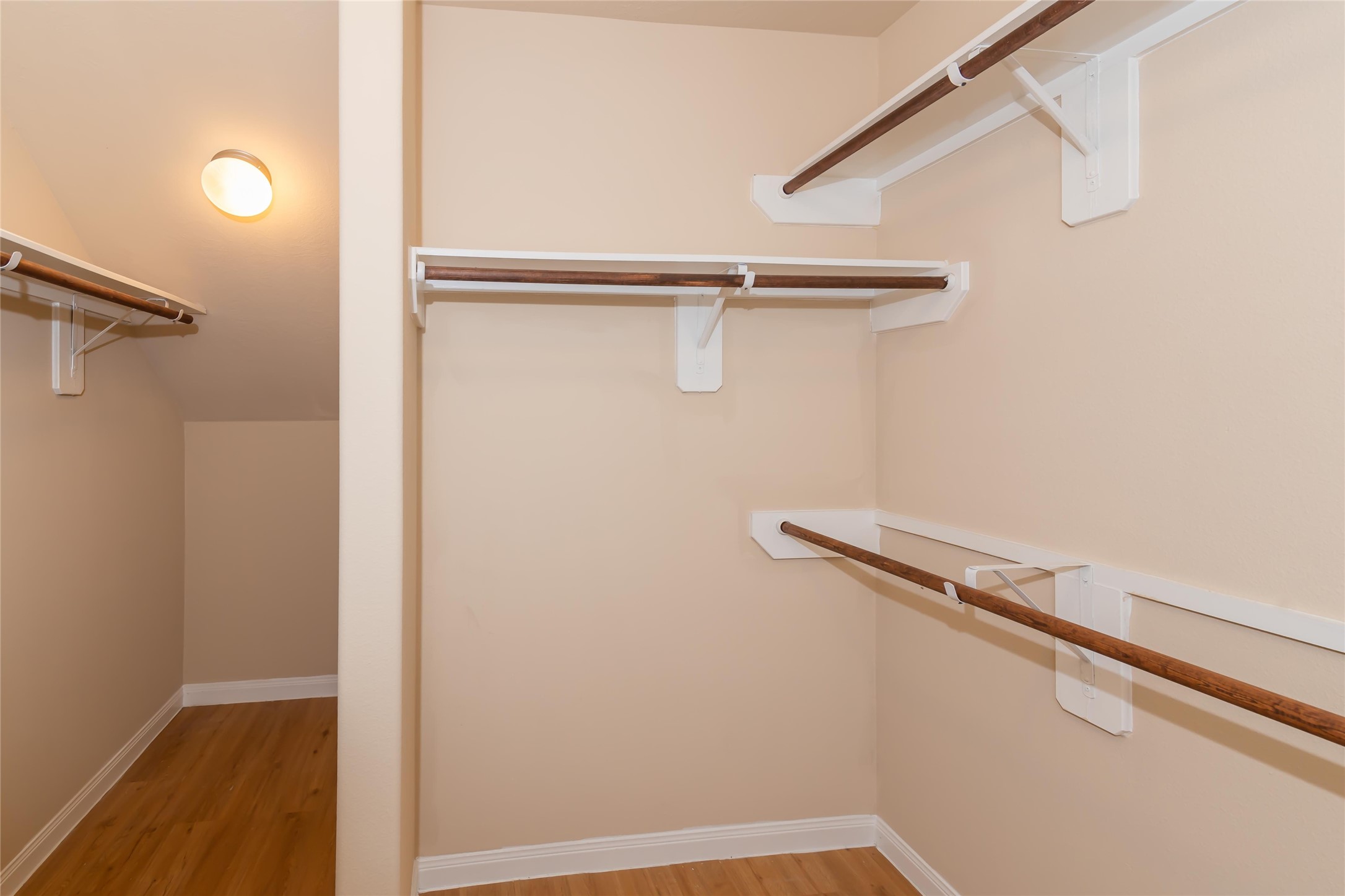 2410 Gibbs Bend Court Houston, TX 77073 - Photo 11 of 12 a view of a room with racks on the wall