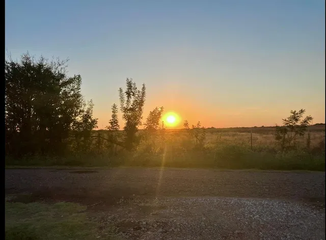a view of an outdoor space with a lake view