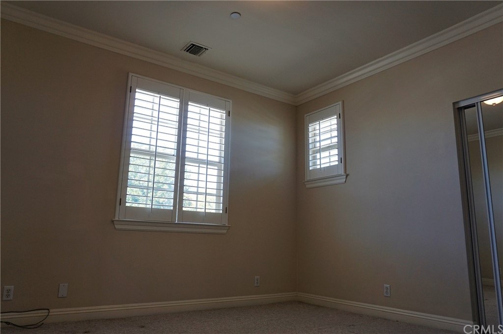 705 Cortez Road Arcadia, CA 91007 - Photo 18 of 70 an empty room with windows