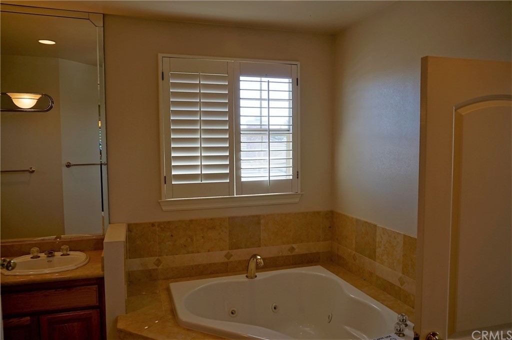 705 Cortez Road Arcadia, CA 91007 - Photo 26 of 70 a bathroom with a sink and a bathtub