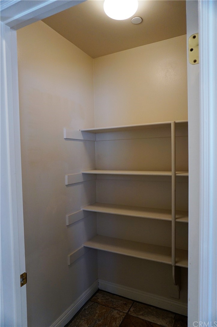 705 Cortez Road Arcadia, CA 91007 - Photo 39 of 70 a view of walk in closet with empty racks