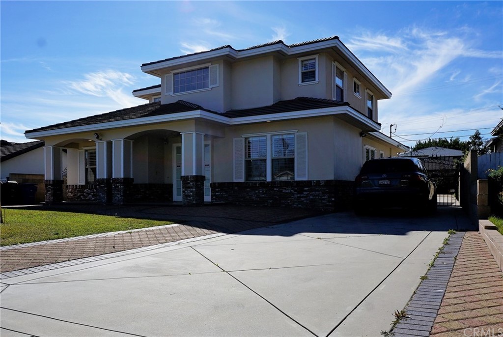 705 Cortez Road Arcadia, CA 91007 - Photo 4 of 70 a front view of a house with a yard