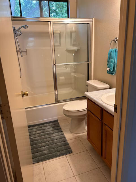 2046 Silverfield Loop Redding, CA 96002 - Photo 4 of 17 a bathroom with a sink and a shower
