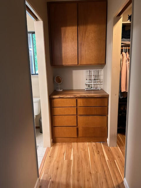 2046 Silverfield Loop Redding, CA 96002 - Photo 7 of 17 a view of a closet with wooden floor