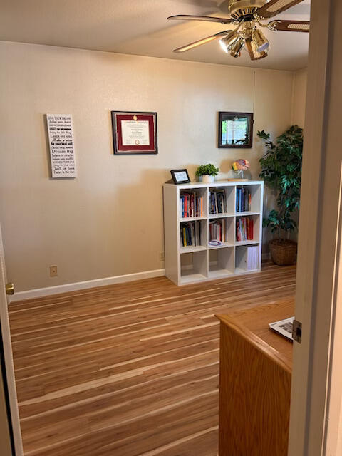 2046 Silverfield Loop Redding, CA 96002 - Photo 10 of 17 a view of a livingroom with shelves