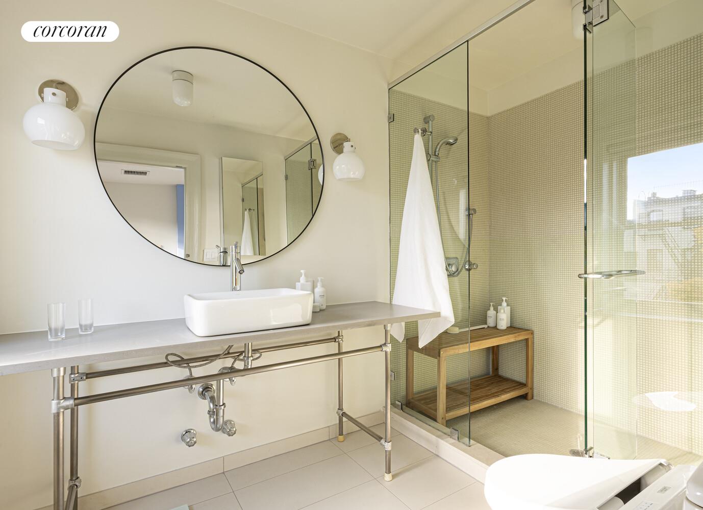 16 2nd Street Brooklyn, NY 11231 - Photo 16 of 67 a bathroom with a sink mirror vanity and a shower