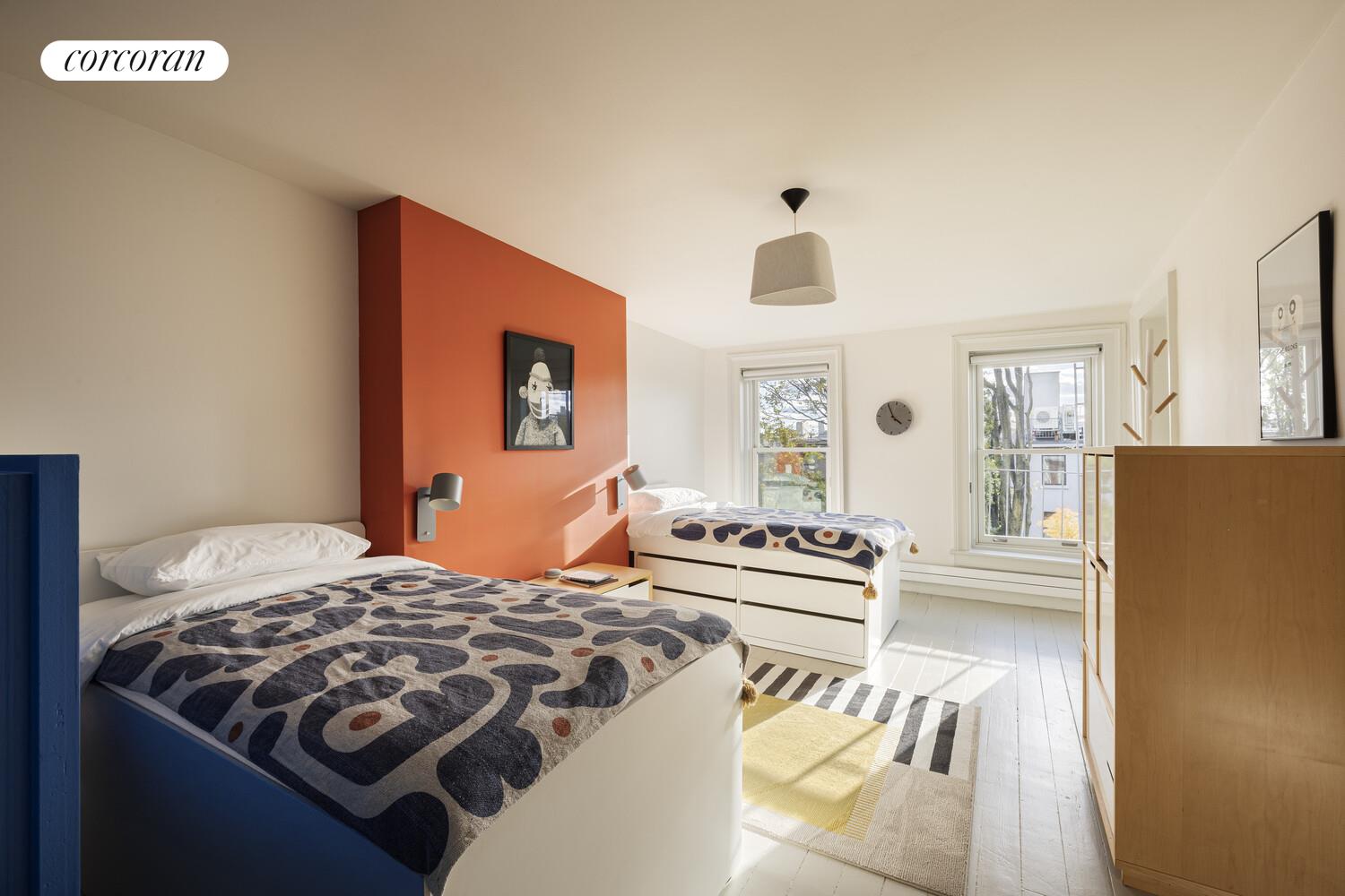 16 2nd Street Brooklyn, NY 11231 - Photo 19 of 67 a bedroom with a bed and a refrigerator