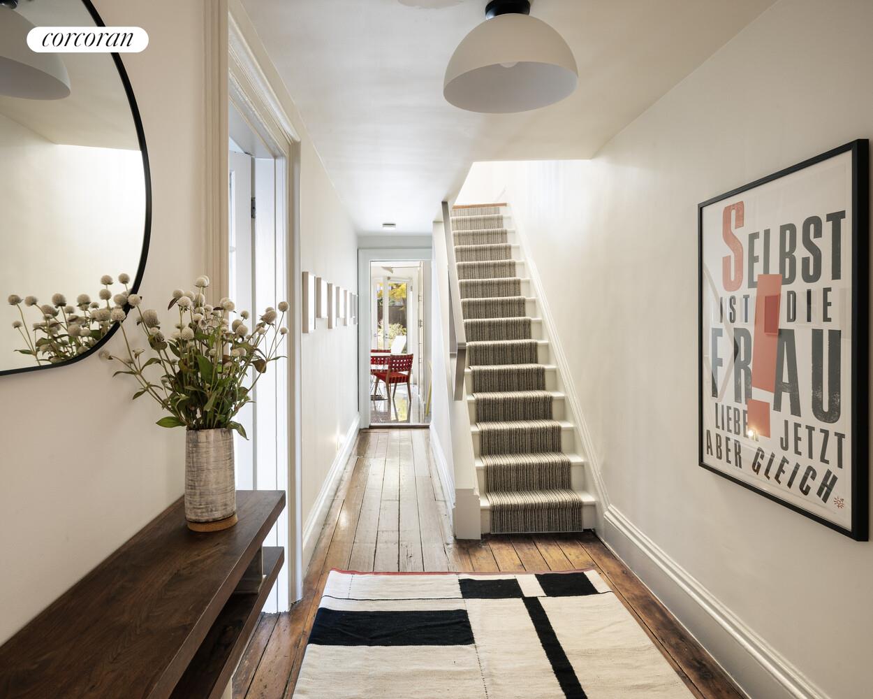 16 2nd Street Brooklyn, NY 11231 - Photo 26 of 67 a view of a hallway with wooden floor and windows
