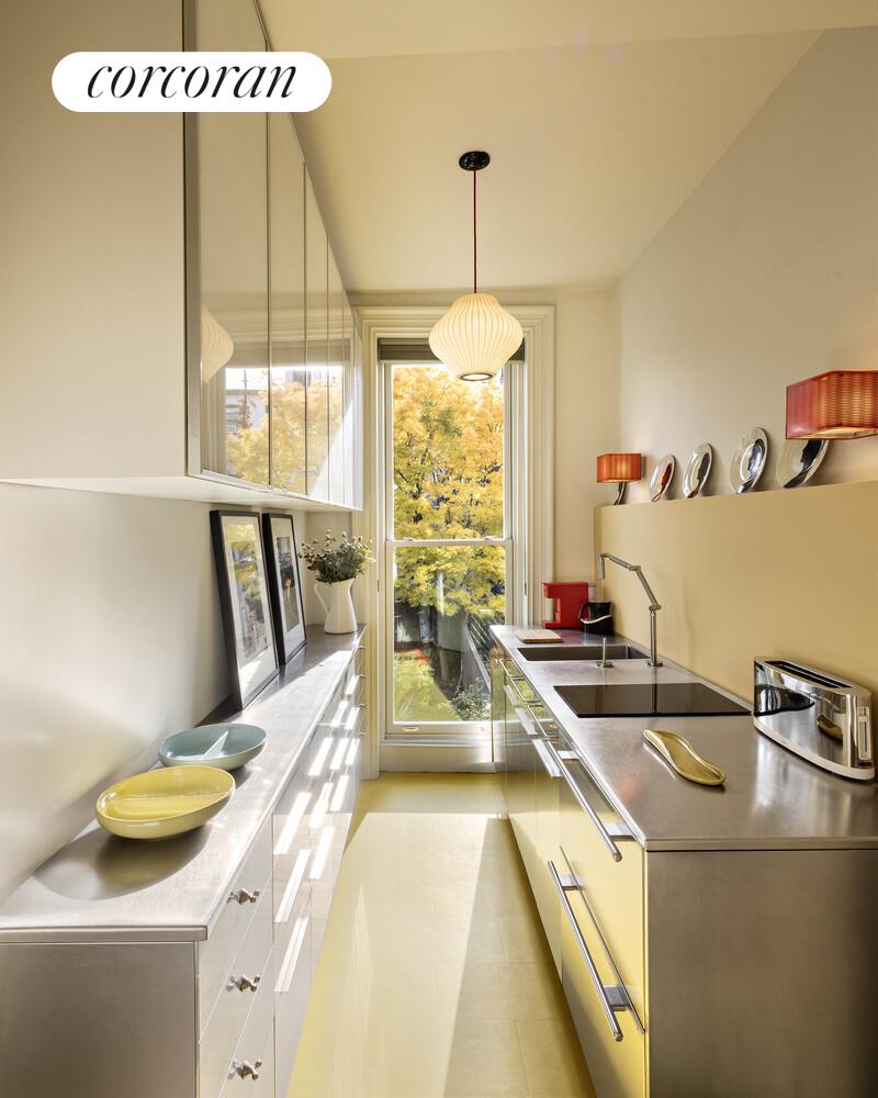 16 2nd Street Brooklyn, NY 11231 - Photo 28 of 67 a kitchen that has a sink and a stove