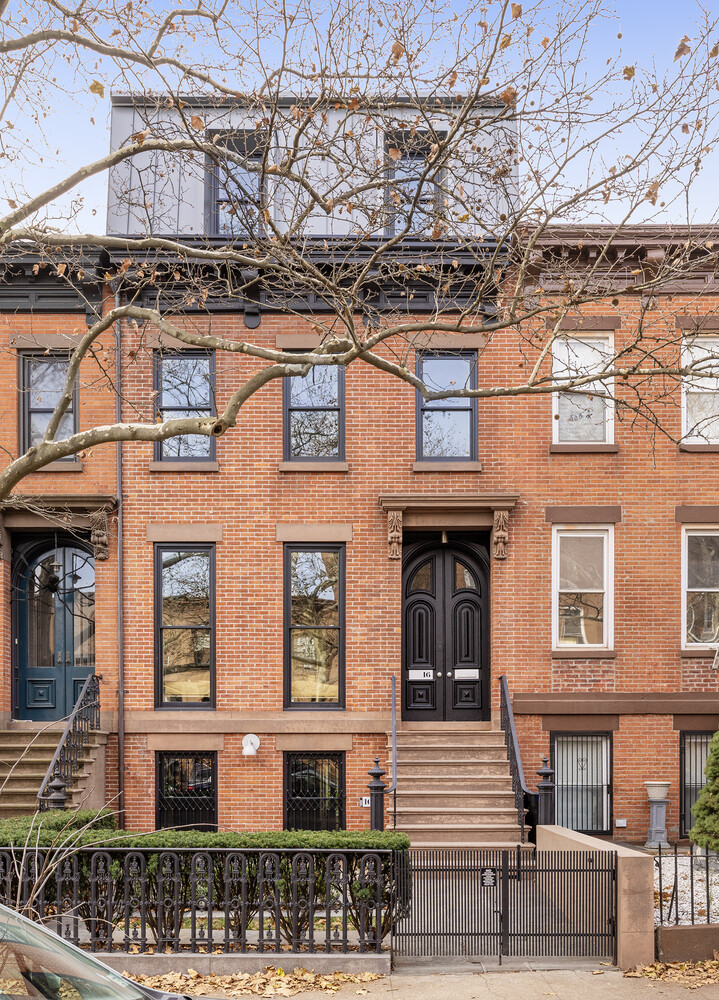 16 2nd Street Brooklyn, NY 11231 - Photo 65 of 67 a front view of a residential apartment building with a yard