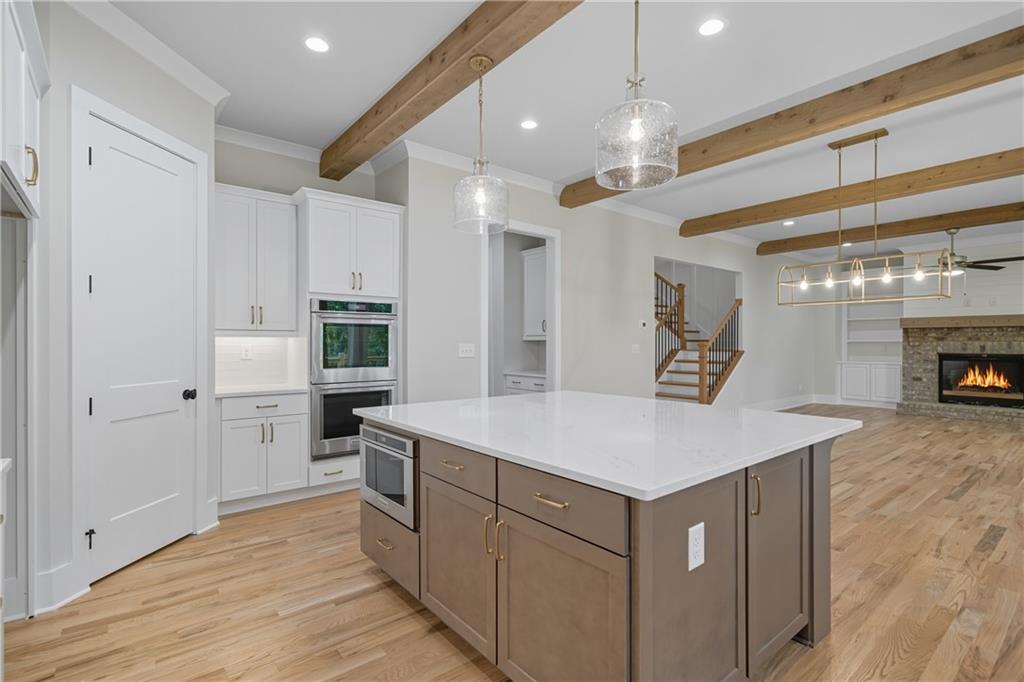 116 Dallas Mark Drive Canton, GA 30115 - Photo 18 of 43 a kitchen with a stove a refrigerator and a oven