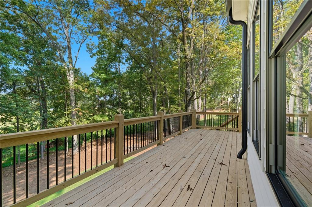 116 Dallas Mark Drive Canton, GA 30115 - Photo 22 of 43 a view of balcony with wooden floor