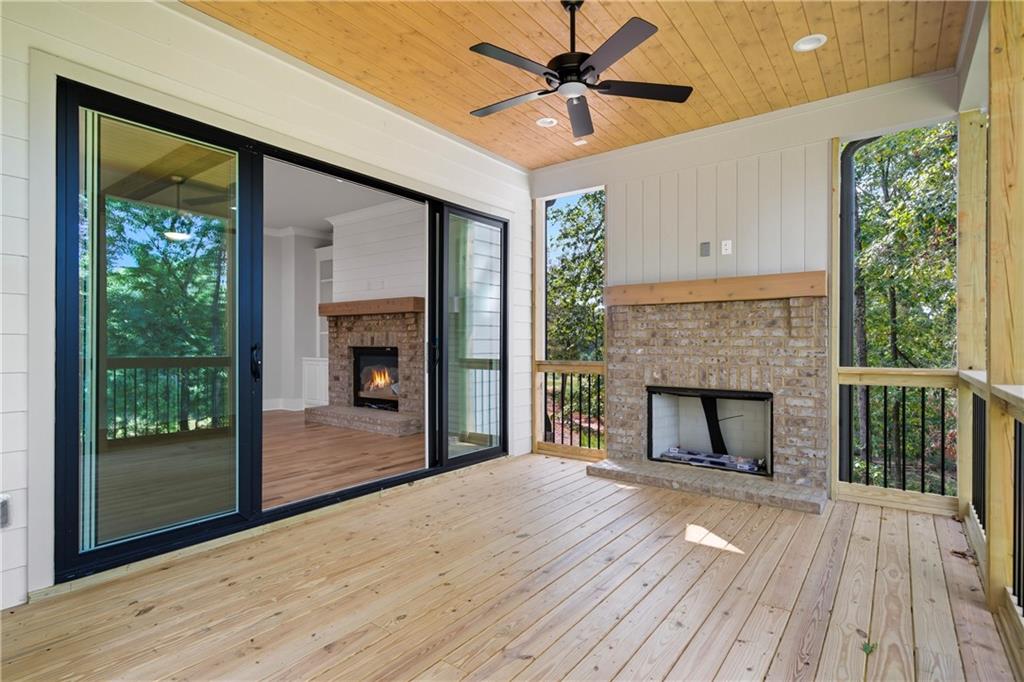 116 Dallas Mark Drive Canton, GA 30115 - Photo 24 of 43 a view of a livingroom with a fireplace and wooden floor