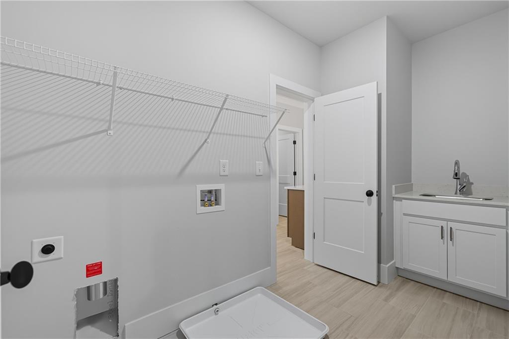 116 Dallas Mark Drive Canton, GA 30115 - Photo 36 of 43 a bathroom with a sink and a shower