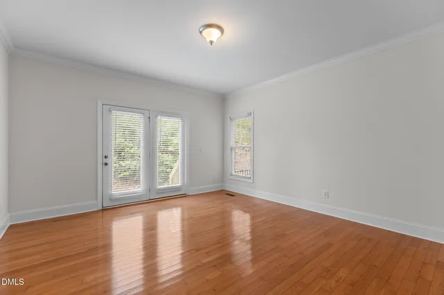 a view of a yard with a tree