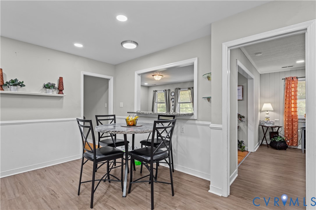 7586 Willson Road Henrico, VA 23231 - Photo 11 of 32 Dining area with wood finished floors and recessed