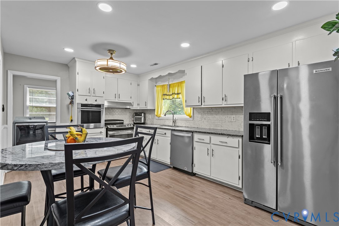 7586 Willson Road Henrico, VA 23231 - Photo 12 of 32 Kitchen featuring appliances with stainless steel