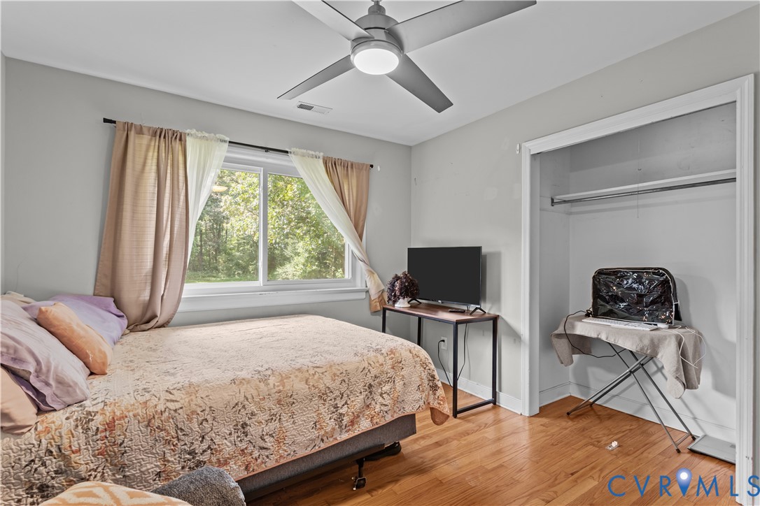 7586 Willson Road Henrico, VA 23231 - Photo 14 of 32 Bedroom featuring light wood-style floors, a ceili