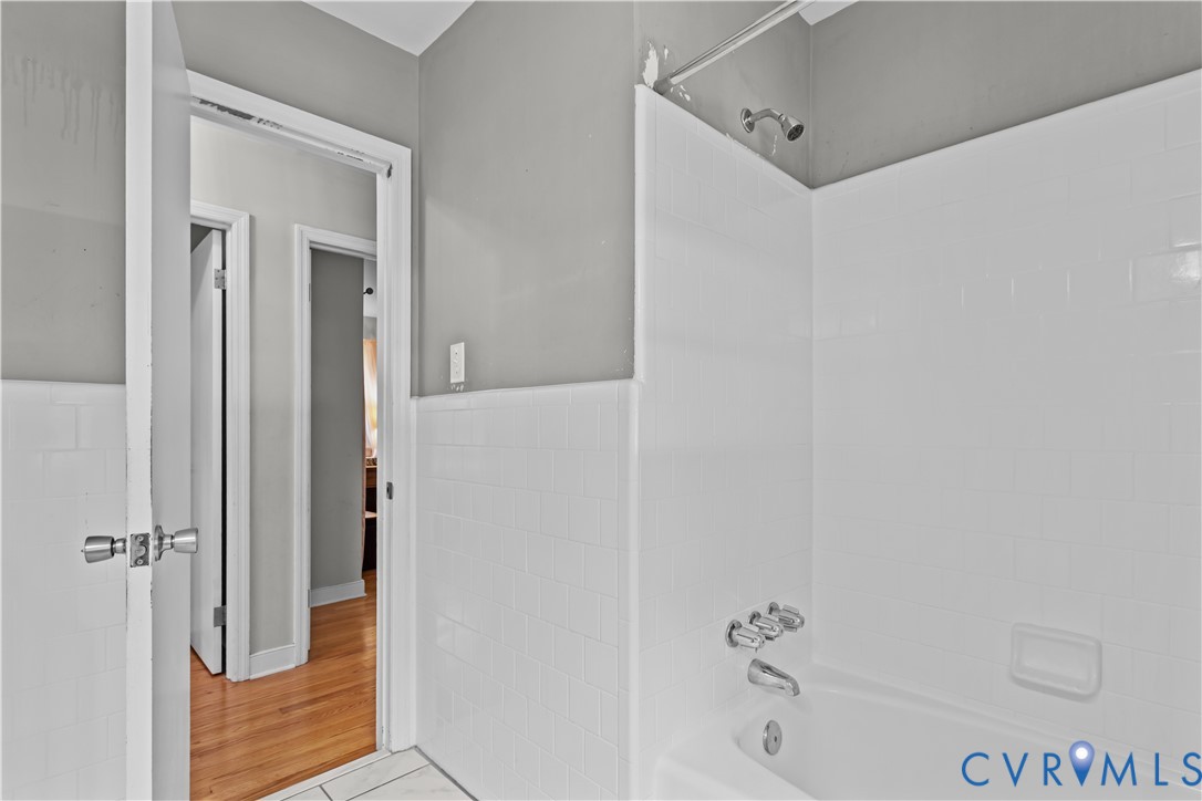 7586 Willson Road Henrico, VA 23231 - Photo 17 of 32 Bathroom with bathtub / shower combination, tile w