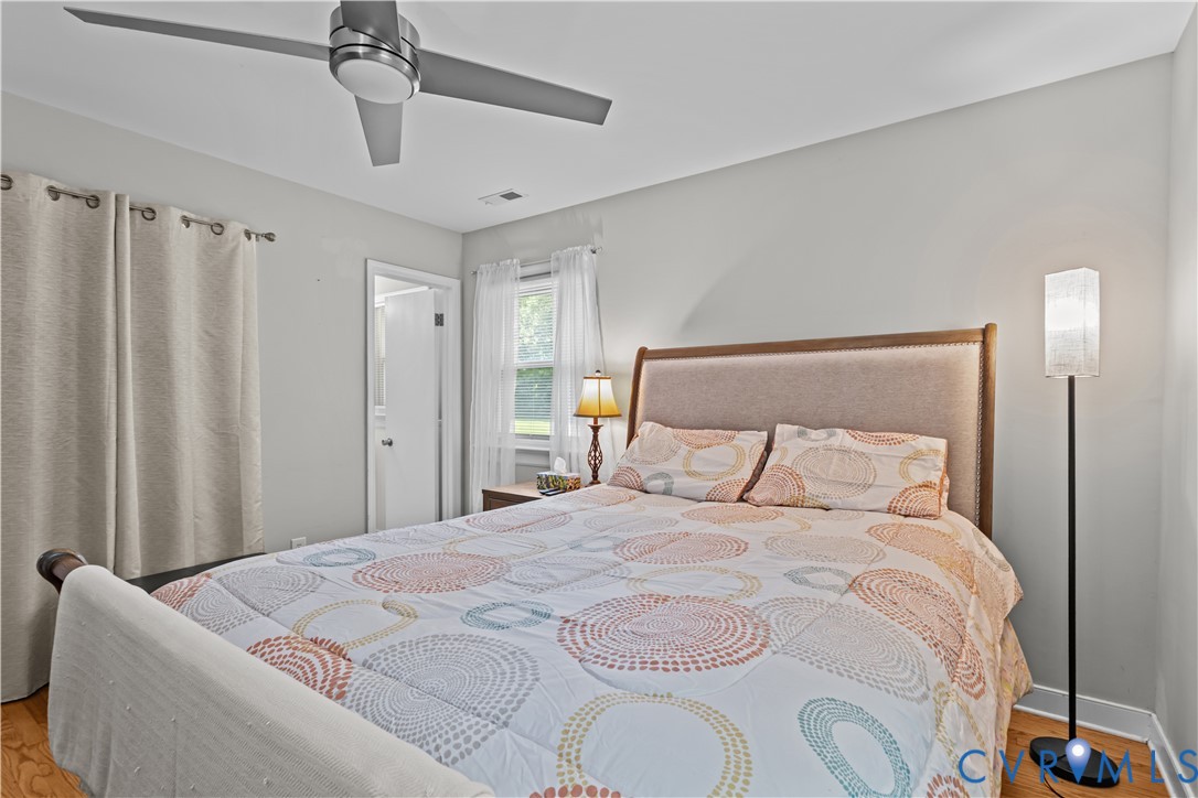 7586 Willson Road Henrico, VA 23231 - Photo 19 of 32 Bedroom with wood finished floors and ceiling fan