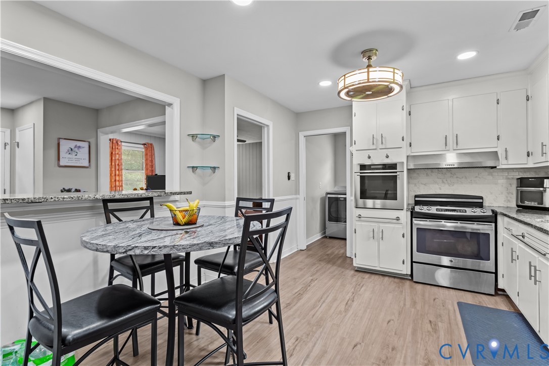 7586 Willson Road Henrico, VA 23231 - Photo 3 of 32 Kitchen featuring stainless steel appliances, whit