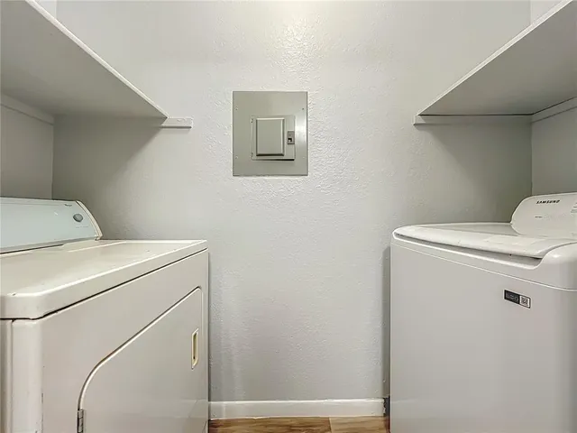 a view of a balcony with wooden floor