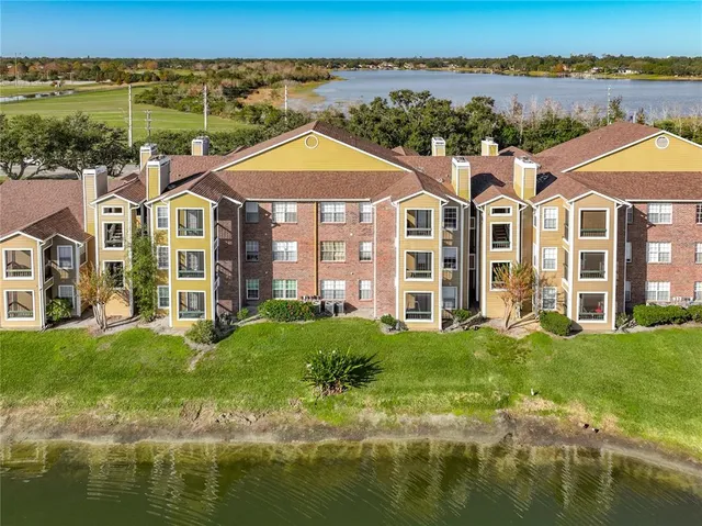 an aerial view of a house with garden space sitting space