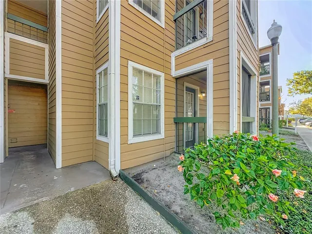 a view of a house with a small garden