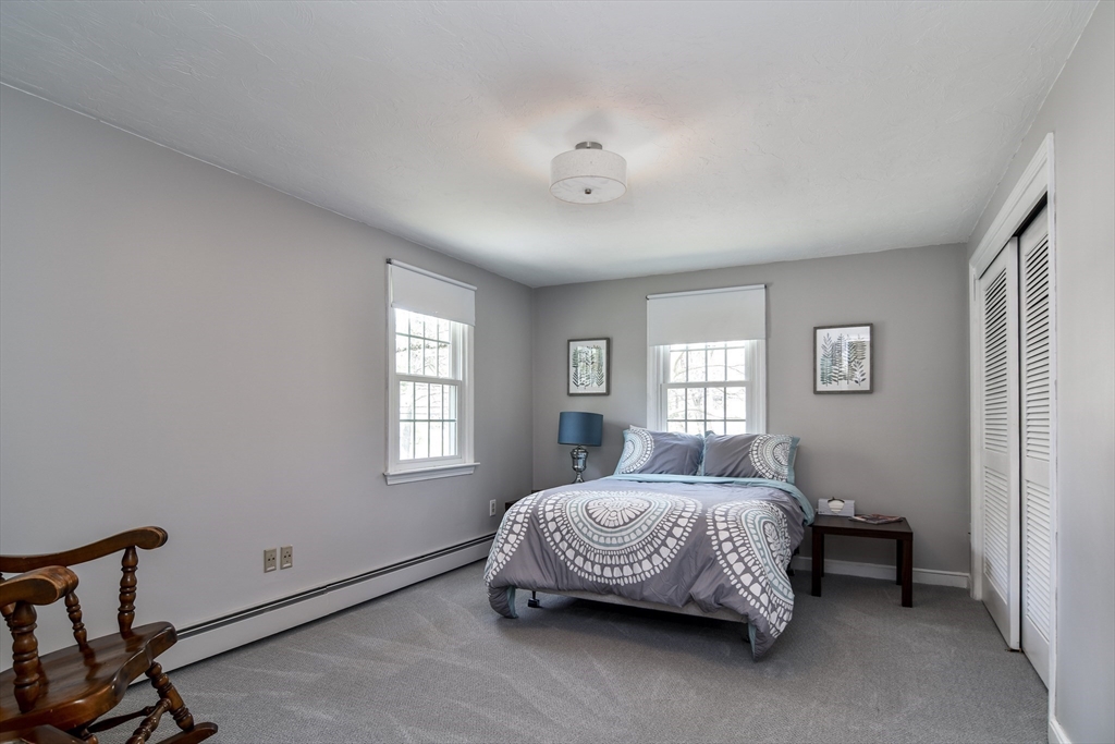 1 Woodside Road Framingham, MA 01701 - Photo 23 of 41 a bedroom with a bed table and window